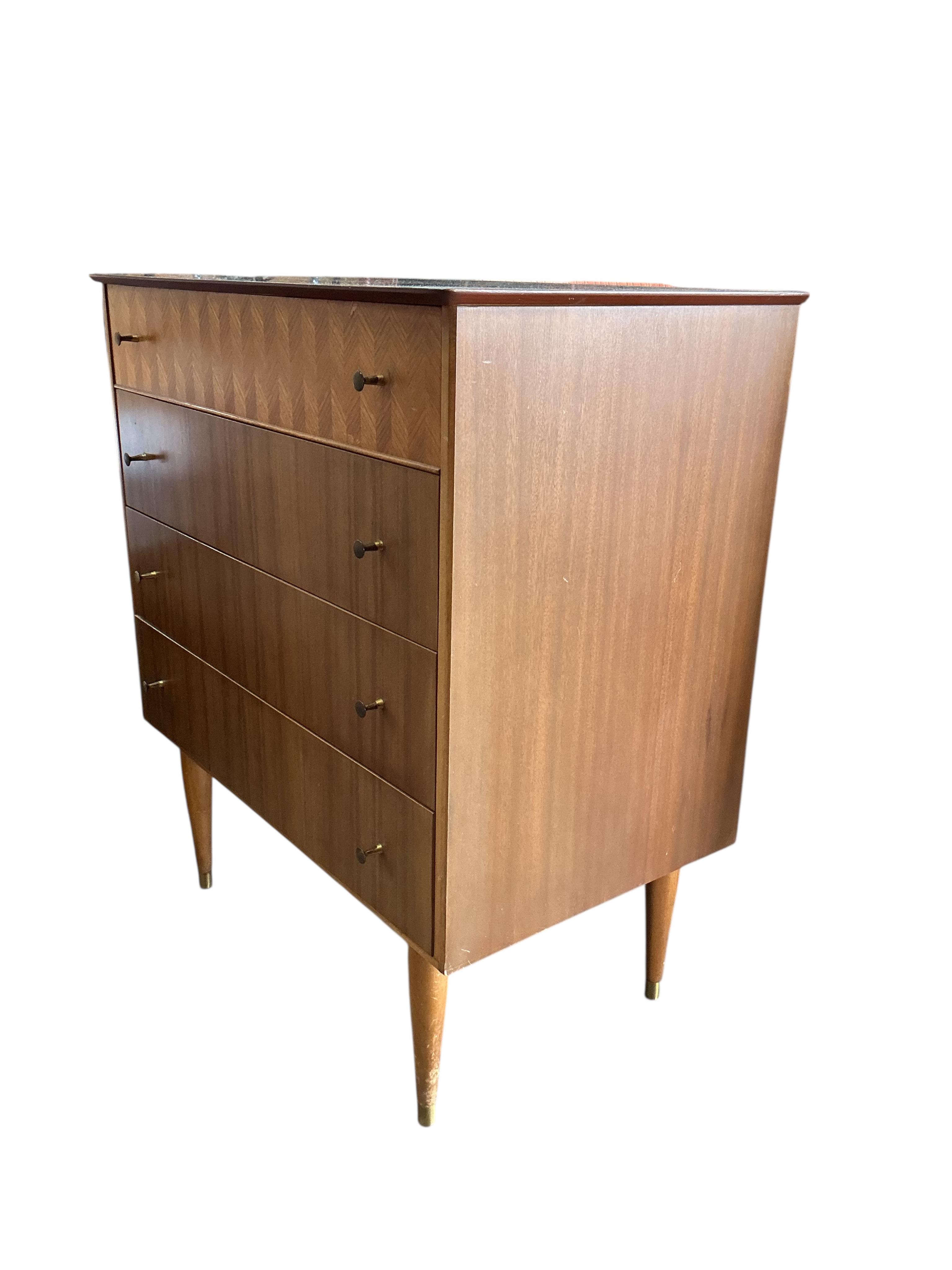 A mid century Uniflex teak chest of four drawers, width 78cm, depth 46cm, height 89cm